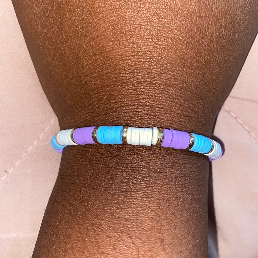 purple white and light blue bracelet
